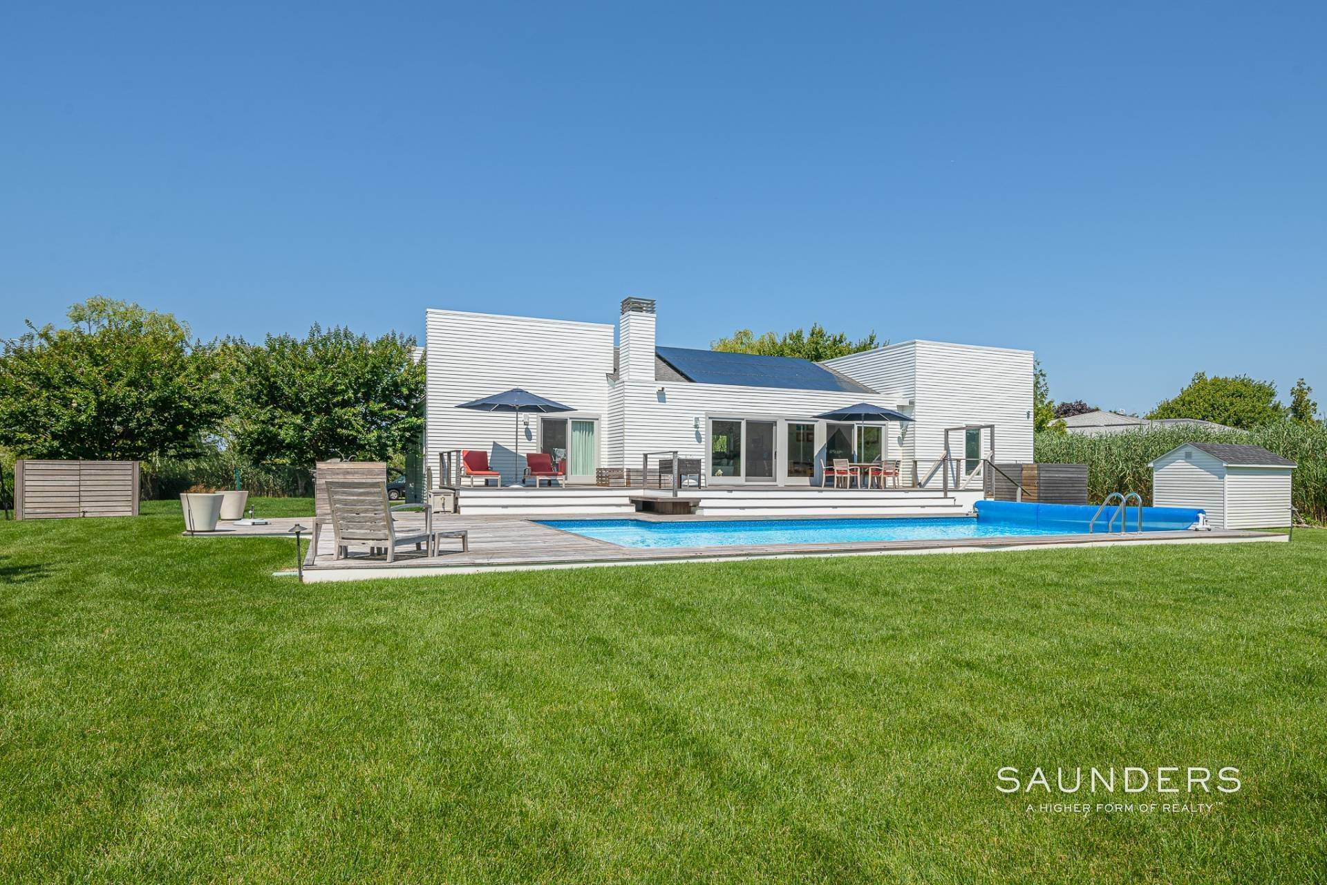 16. Single Family Homes for Sale at Charming, Turnkey Contemporary With Heated Pool 12 Stillwaters Lane, Westhampton Beach Village, NY 11978