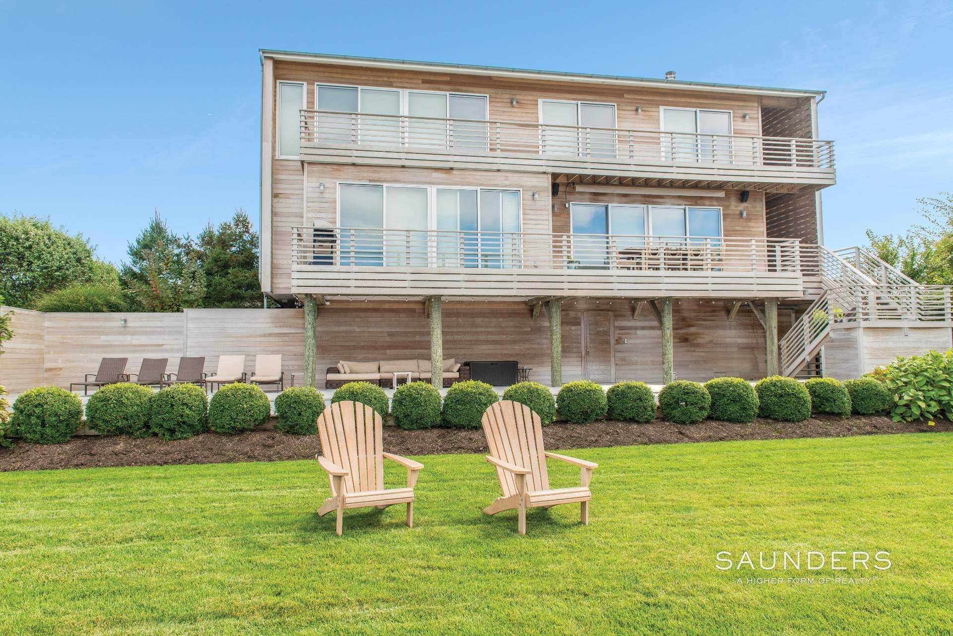 6. Single Family Homes for Sale at Dune Road Canalfront With 50' Lap Pool, Boat Slip & Ocean Access 43 Dune Road, Quogue, NY 11959