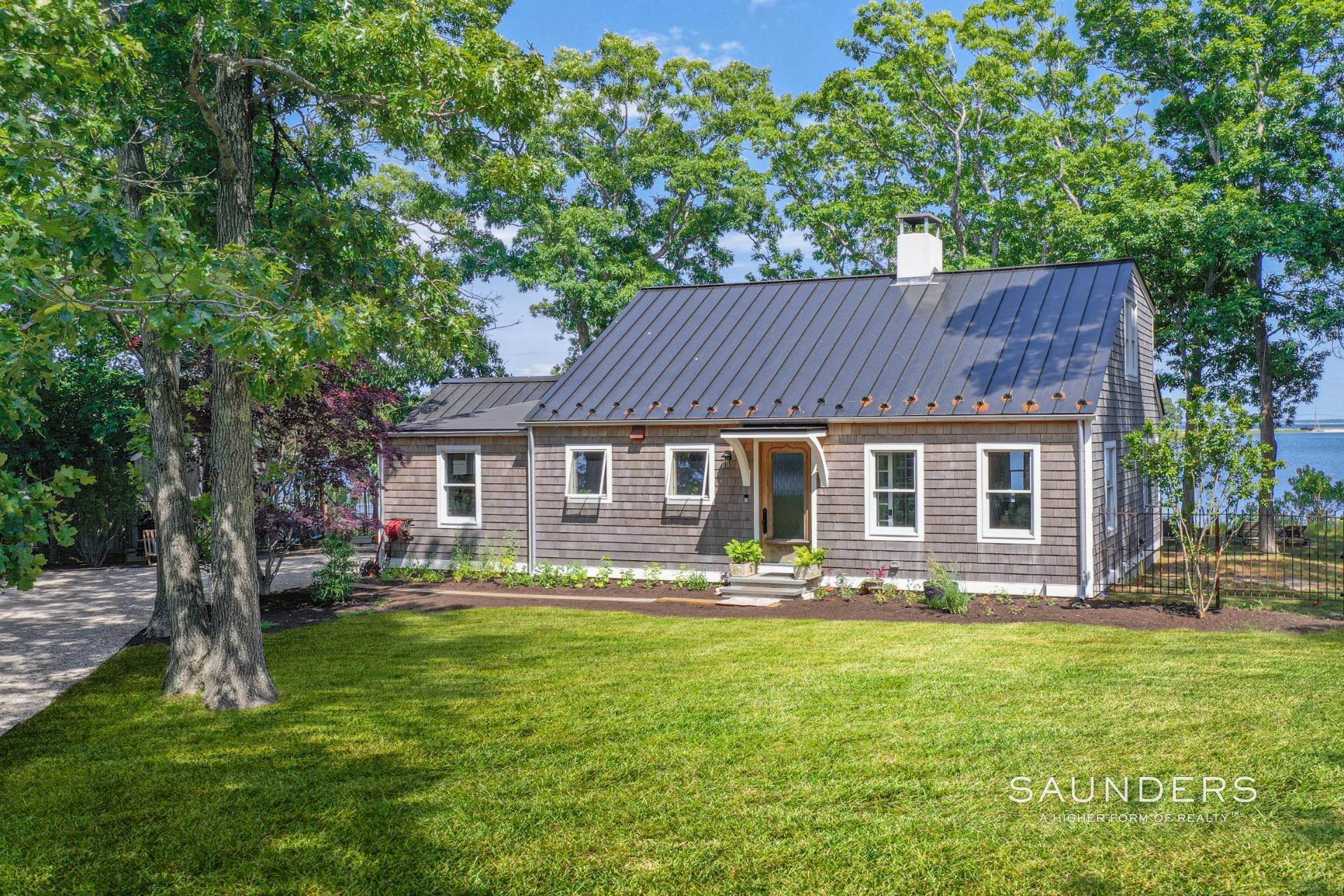 6. Single Family Homes for Sale at Charming Waterfront Cottage With Expansion Variance In Place 1082 Springs Fireplace Road, Springs, East Hampton, NY 11937