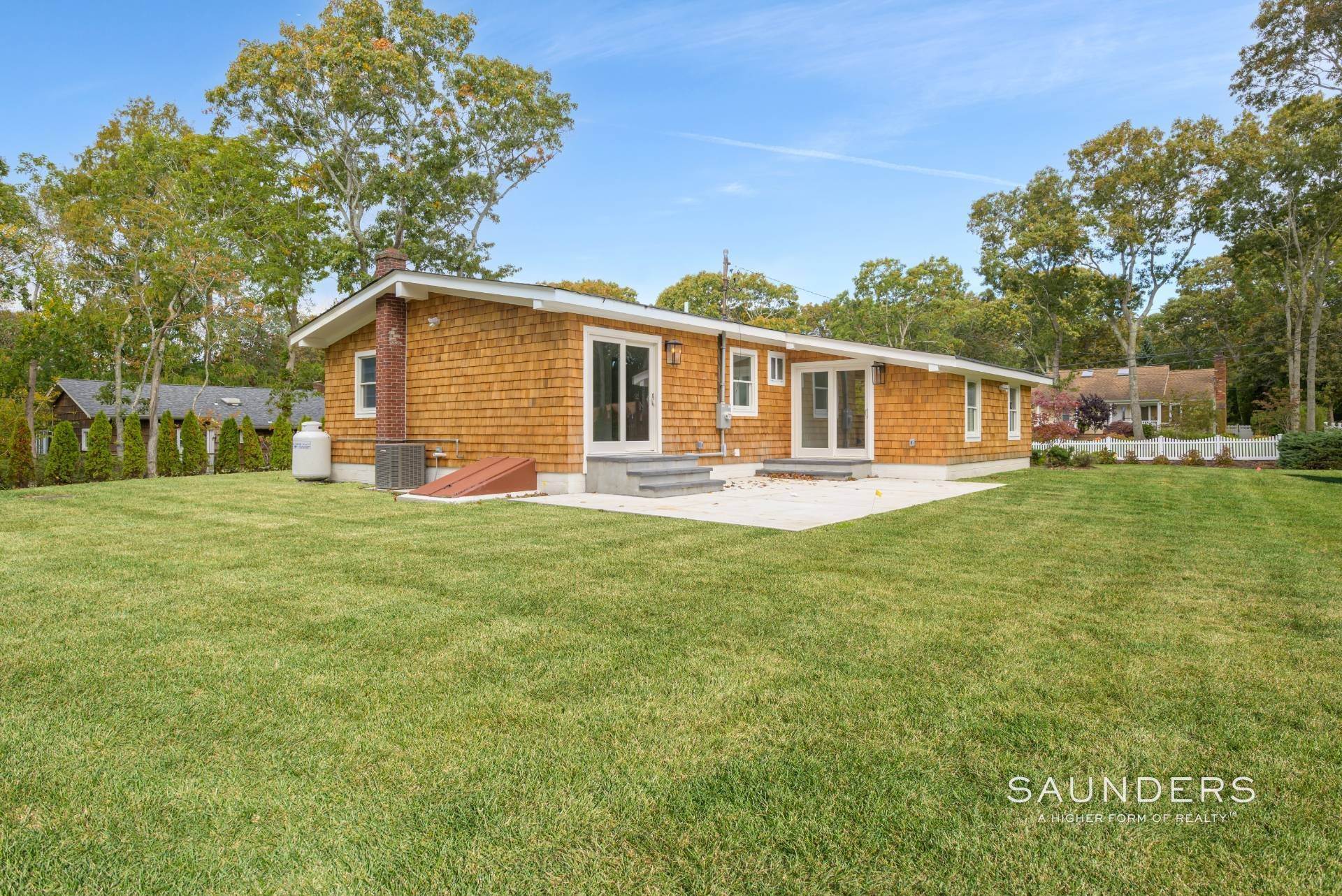 4. Single Family Homes for Sale at Completely Done, Sought-After Location. Must See! 11 Rolling Hill Road, Hampton Bays, NY 11946