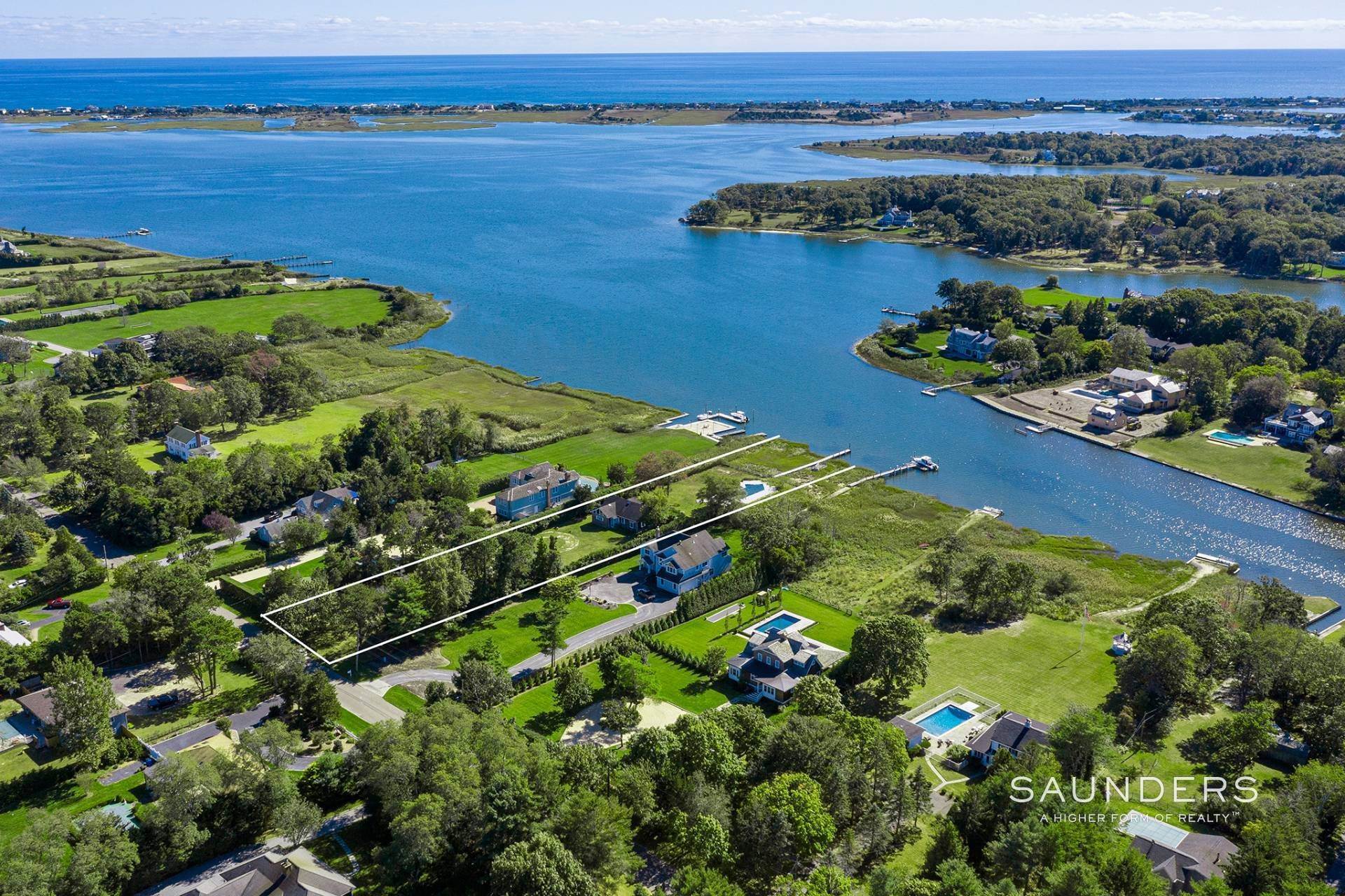 Single Family Homes for Sale at Waterfront Opportunity With Pool And Deep-Water Dock 24 Sunset Avenue, East Quogue, NY 11942